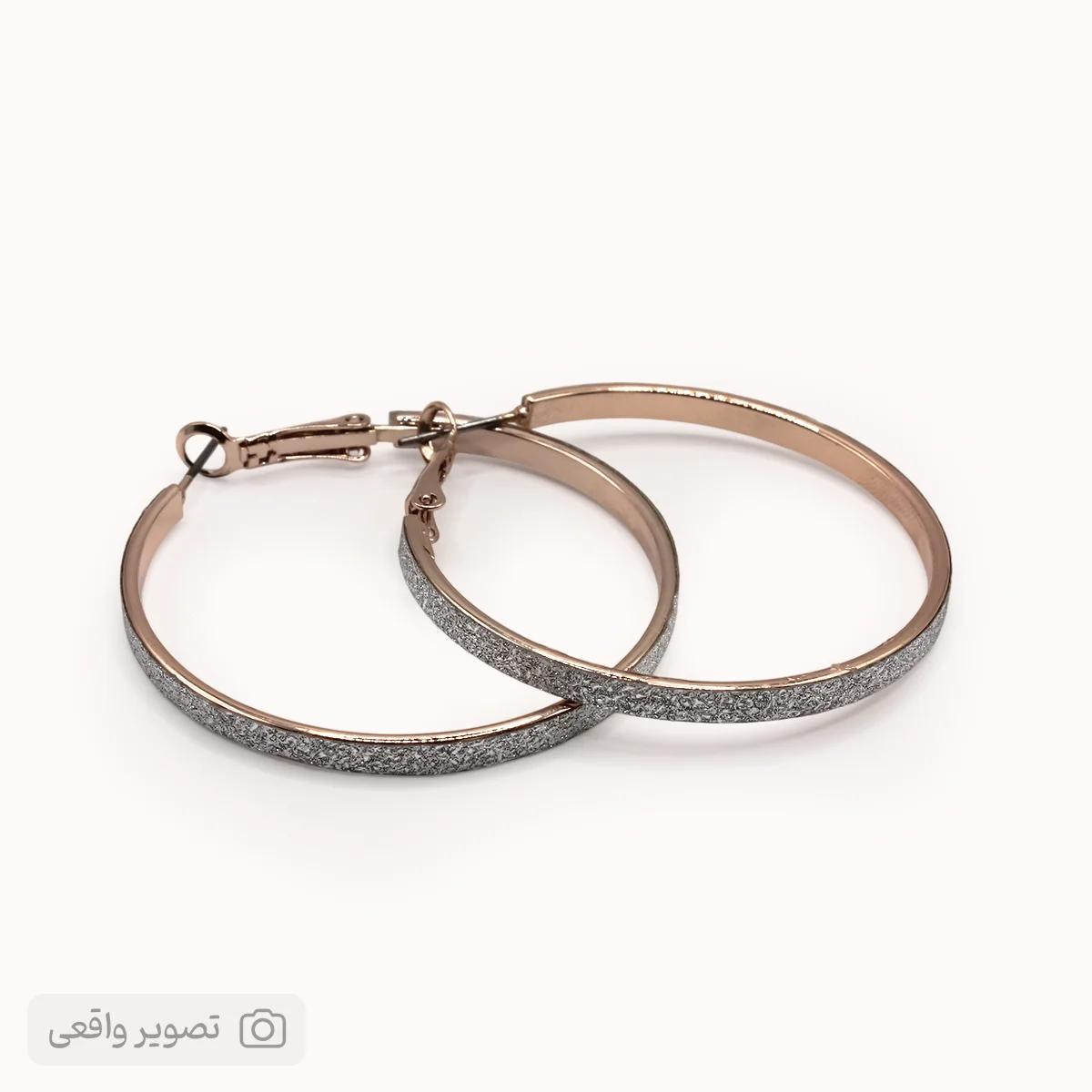 گوشواره حلقه‌ای زنانه شاینی مدل 01 نقره‌ای | فروشگاه اینترنتی زابزبا
